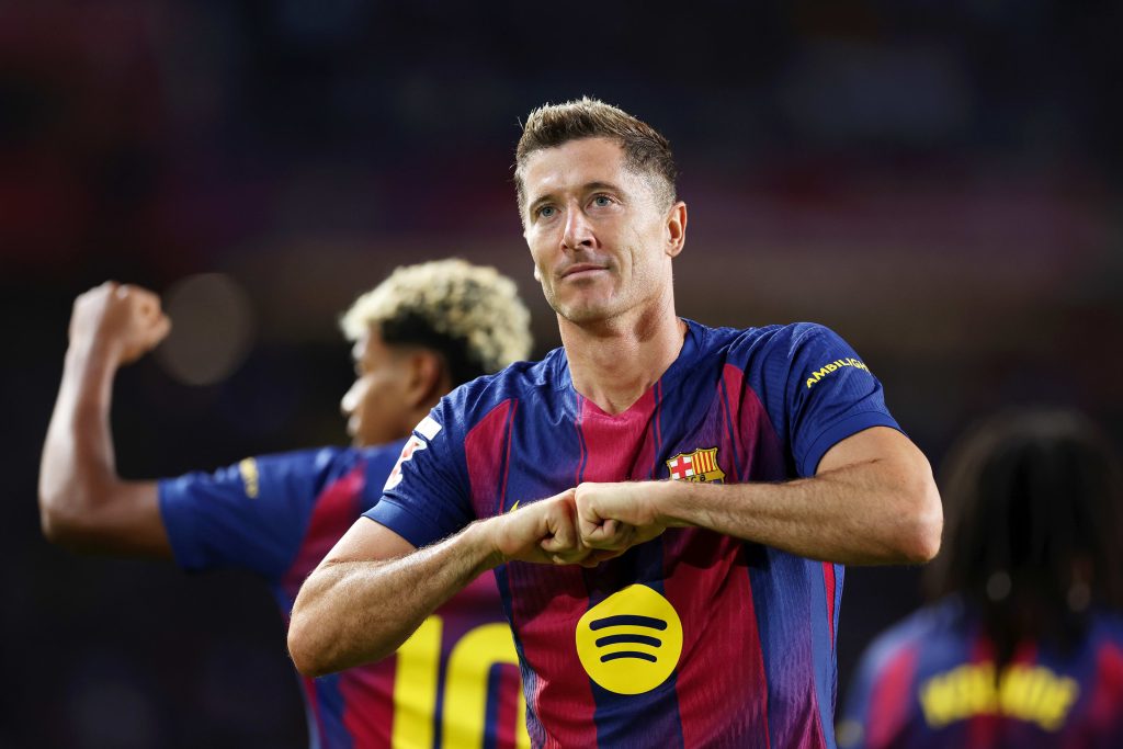 Robert Lewandowski celebration for Barcelona with Lamine Yamal in the background