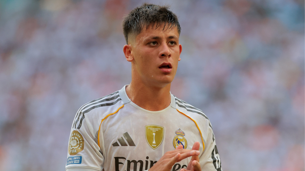 Arda Guler in a Real Madrid shirt clapping