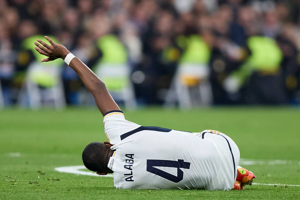 David Alaba laying on the ground injured for Real Madrid