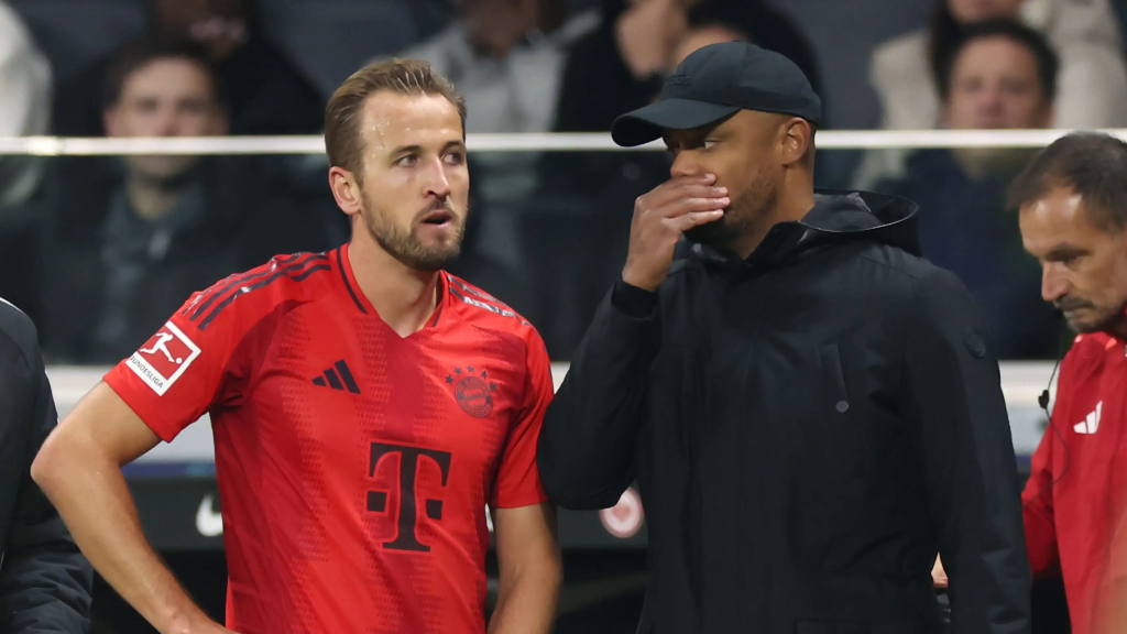 Harry Kane and Vincent Kompany discussing tactics for Bayern Munich