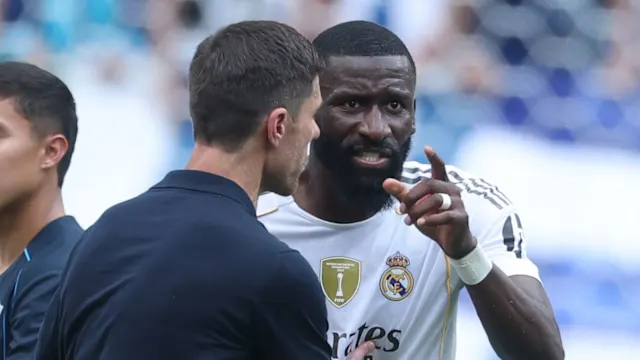 Xabi Alonso and Antonio Rudiger talking