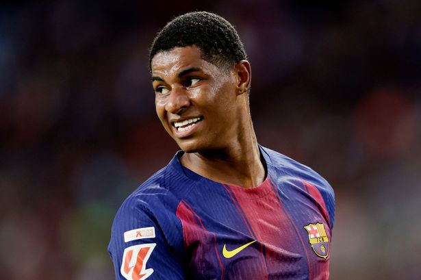 Marcus Rashford smiling at Barcelona