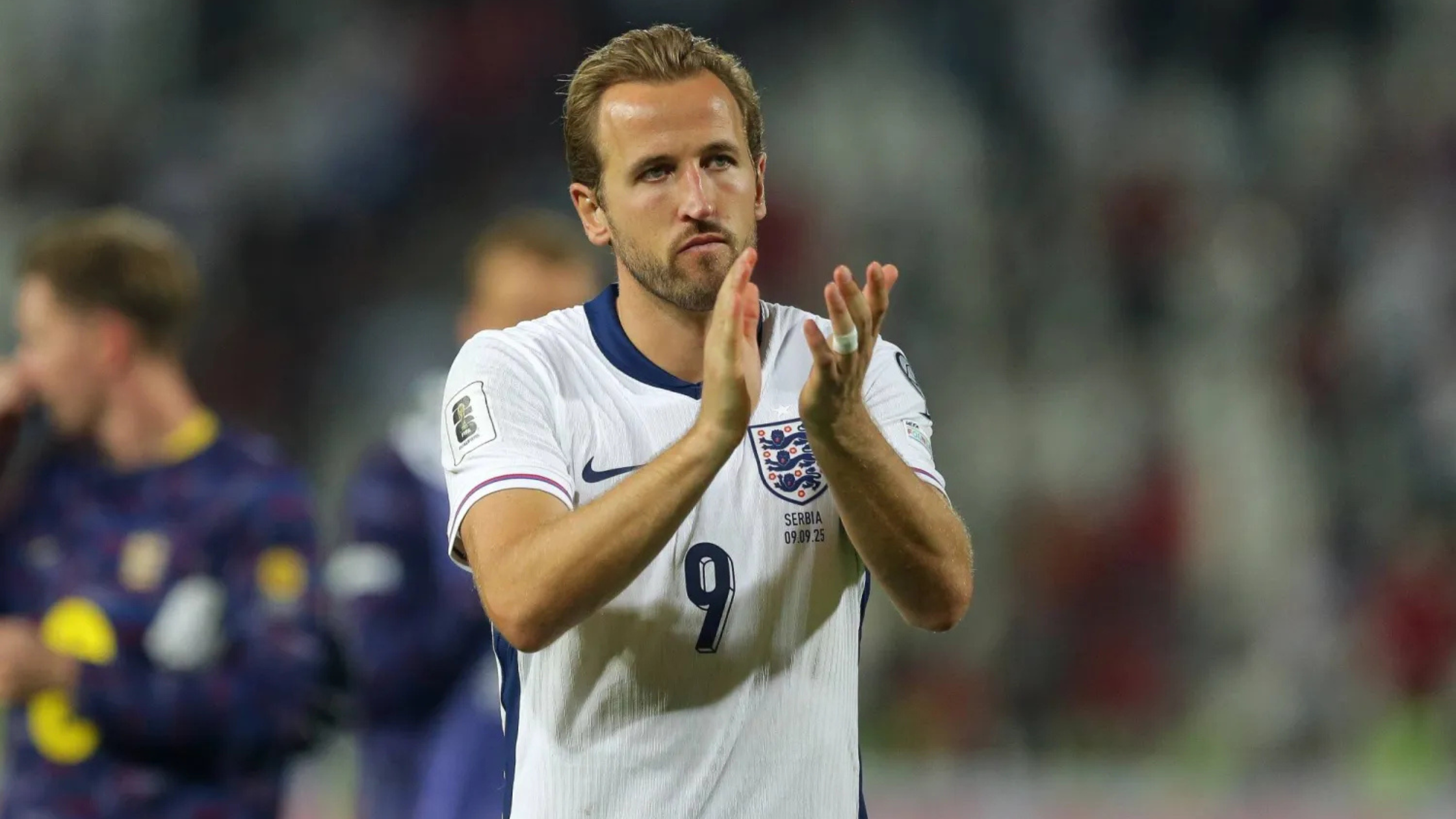 Frontview of Harry Kane clapping while playing for England