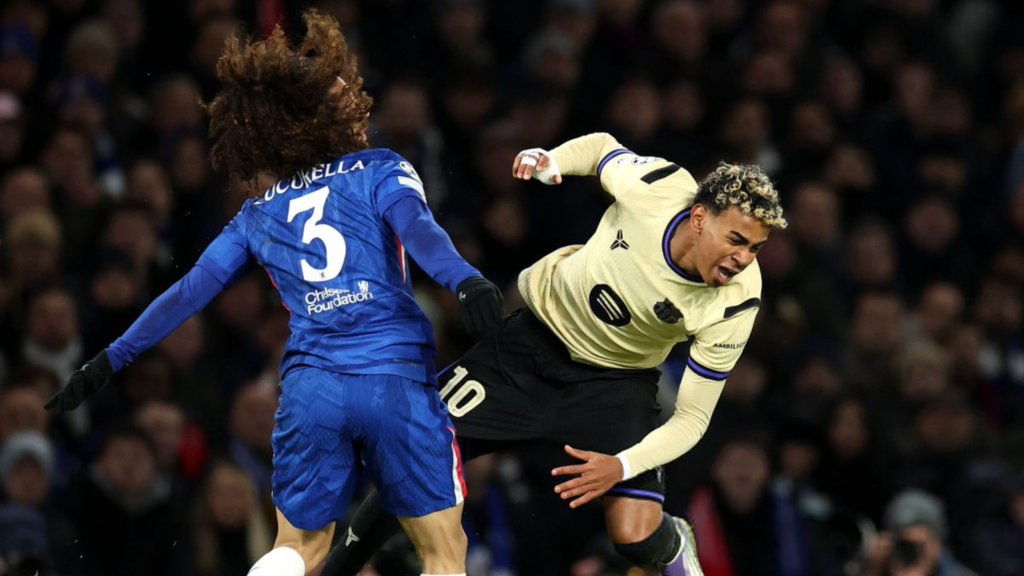 Marc Cucurella tackling Lamine Yamal