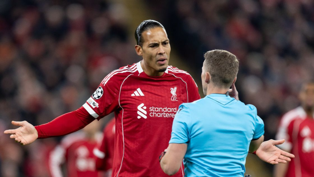 Virgil Van Dijk complaining to the ref
