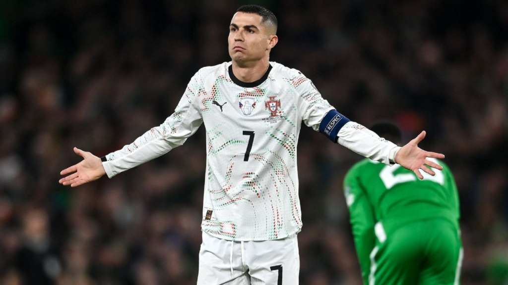 Cristiano Ronaldo shrugging in a Portugal shirt