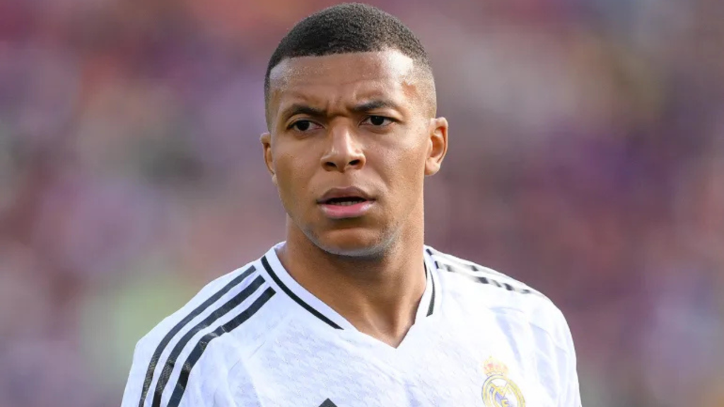 Kylian Mbappe looking frustrated in a Real Madrid shrit