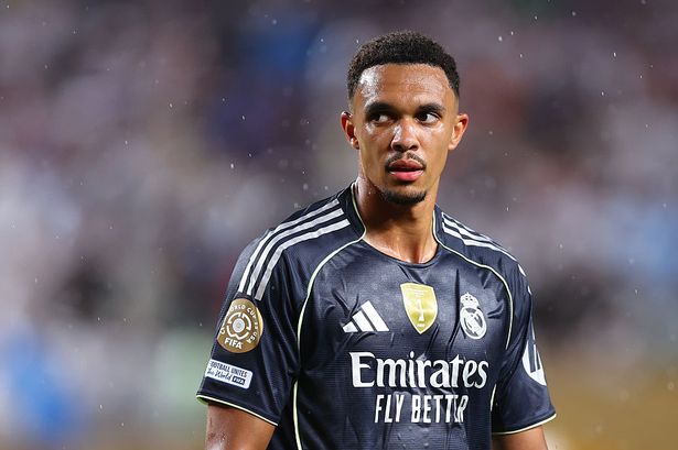 Frontview of Trent Alexander Arnold in a black Real Madrid kit