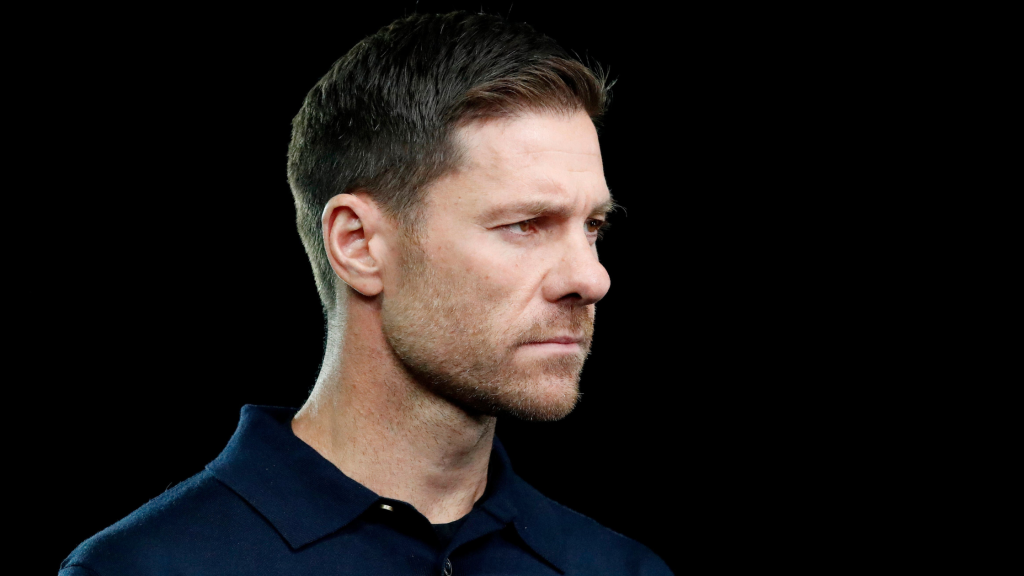 Sideview of Xabi Alonso looking focused