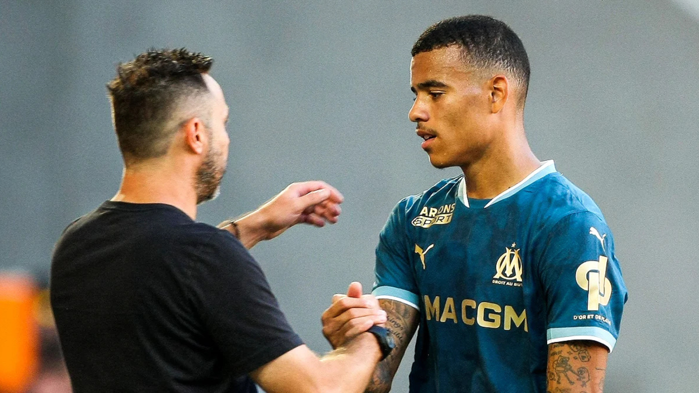 Roberto De Zerbi and Mason Greenwood handshake in Marseille
