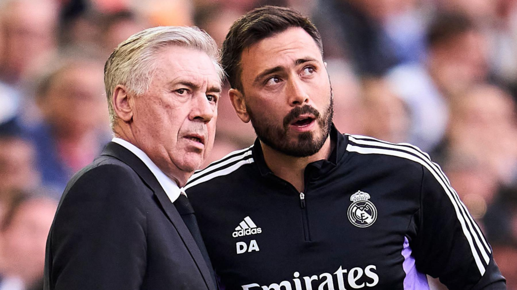 Carlo and Davide Ancelotti discussing 