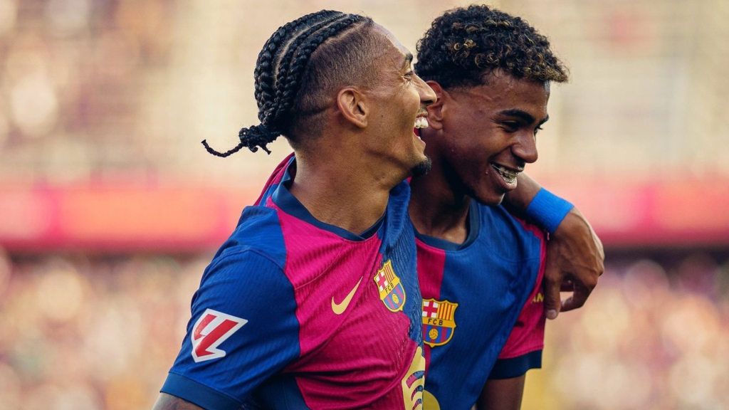 Raphinha and Lamine Yamal celebrating together for Barcelona