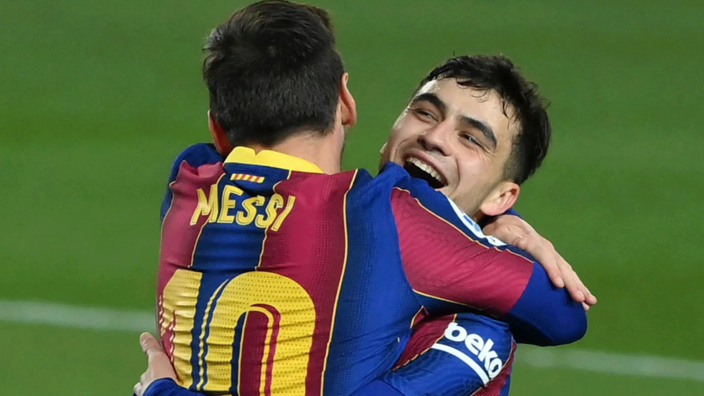 Lionel Messi and Pedri hug as Barcelona players