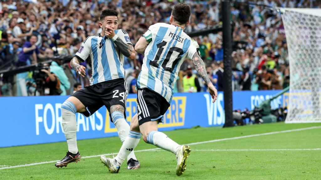 Enzo Fernandes and Lionel Messi celebrating for Argentina