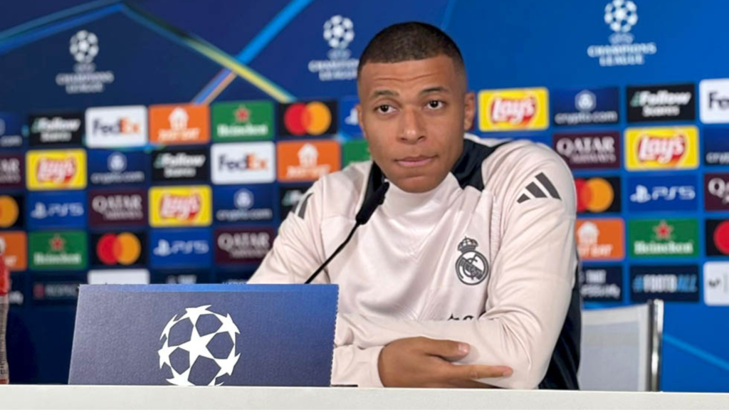 Kylian Mbappe at a press conference as Real Madrid player