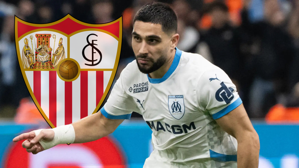 Нил Мопеј и логото на Севиља