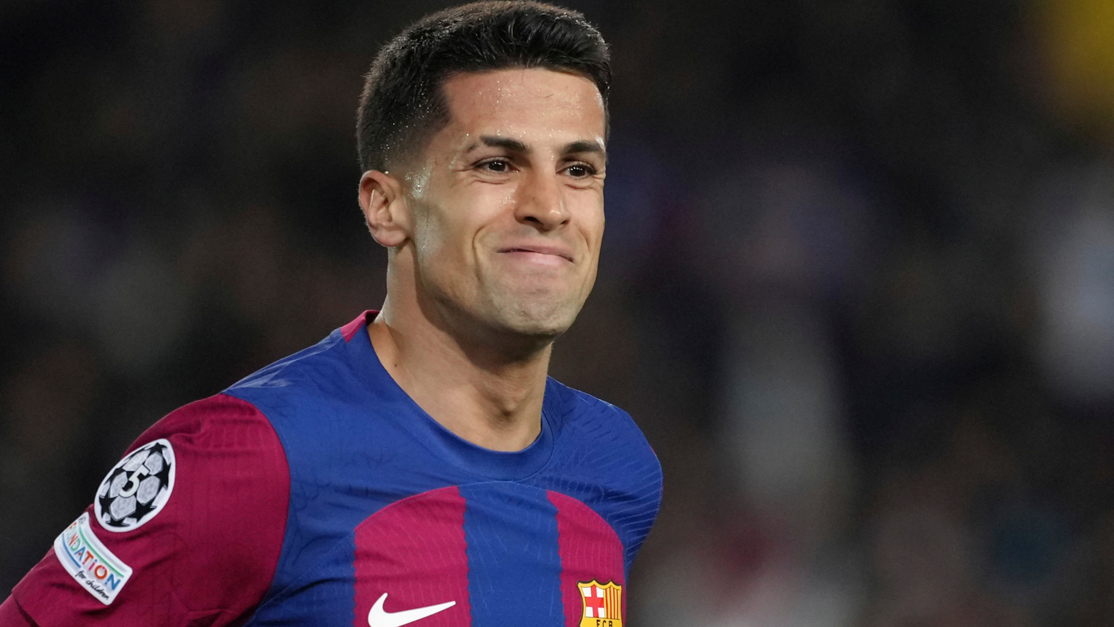 Жоао Кансело се смее