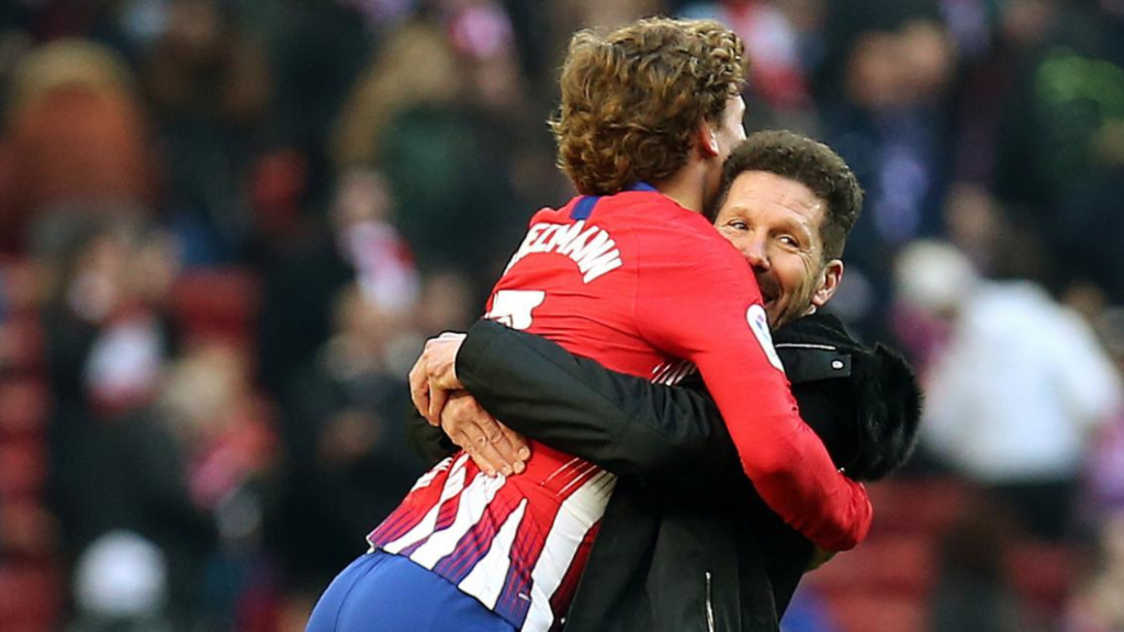 Гризман и Симеоне во прегратка